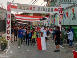 Bhabinkamtibmas Tanah Tinggi bersama FKDM Lakukan Pengamanan Lari Maraton HUT RI