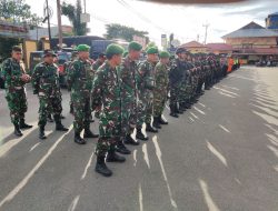 Kodim 1710/Mimika Bersama Polres Mimika Laksanakan Apel Gelar Pasukan Pengamanan Tahun Baru 2025