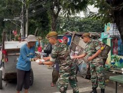 Prajurit Batalyon Arhanud 6/BAY Gelar Kegiatan Sosial Bagi Bagi Nasi Kotak diBulan Suci Ramadhan 1446 H.