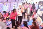 Bhayangkari Peduli dan Polwan Peduli, Korban Kebakaran Muara Angke, Salurkan Ratusan Paket Bantuan