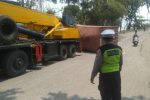 Respon Cepat 110, Kontainer Terlepas dari Truk Trailer di Jembatan KBN Marunda, Polisi Bergerak Cepat Lakukan Evakuasi